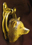 Smaoyed Small Door Knocker. side view